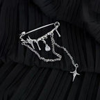 Liquid metal tassel brooch