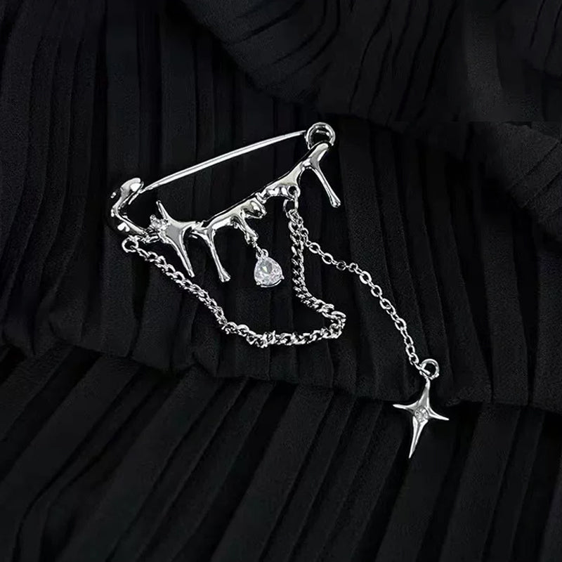 Liquid metal tassel brooch
