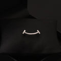 Smiling collar brooch