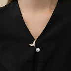 Pearl collar fishtail brooch