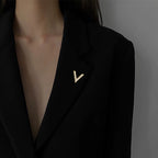 V-shaped shell brooch