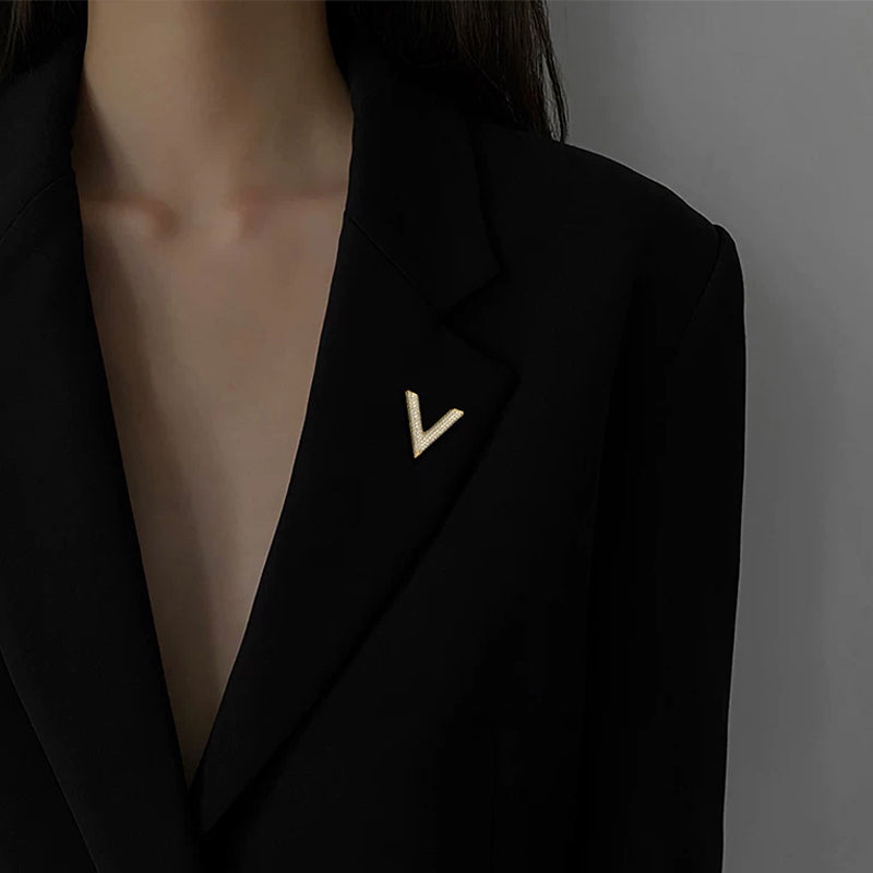 V-shaped shell brooch