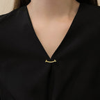 Smiling collar brooch